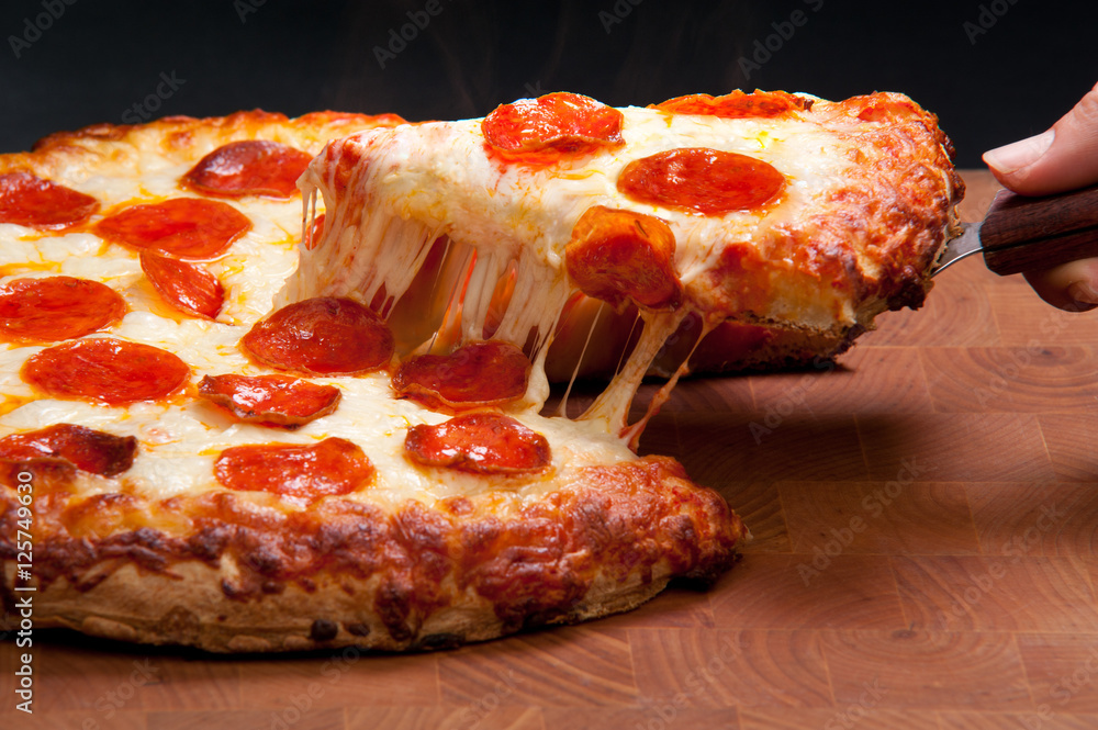 Pepperoni pizza with cheese pull