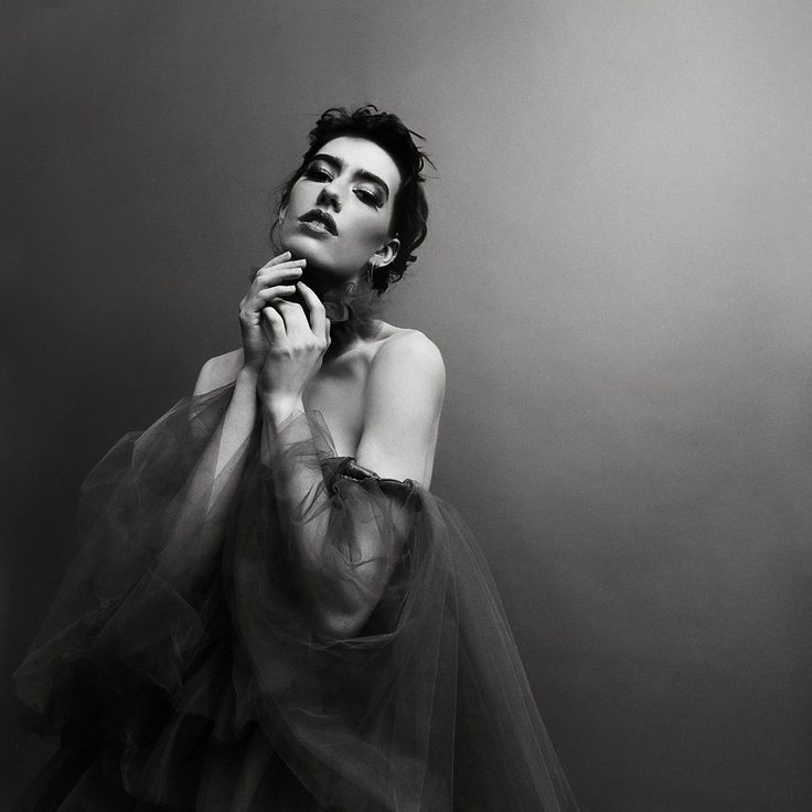 Editorial fashion silhouette in a cinematic interior